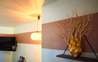 Elegant Gold Vine Decor on Floating Shelf & Chair Table - Big Bear Lodge